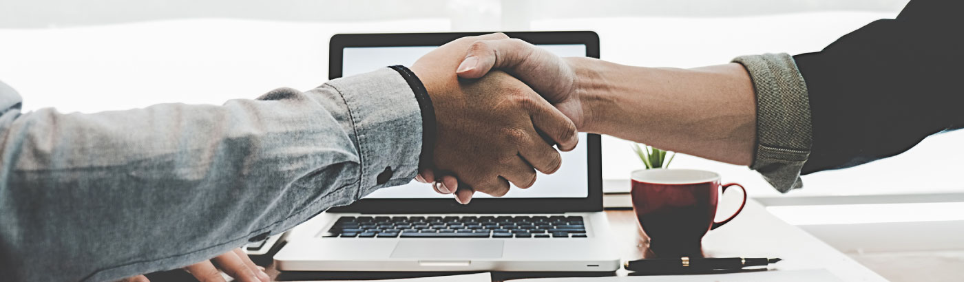 two people shaking hands